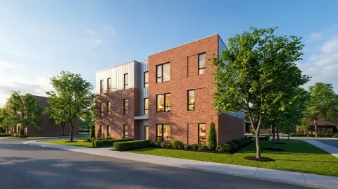 Multiplex modulaire en bois de six logements au centre-ville de Matane, revêtement de bois clair